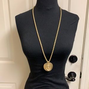 Gold necklace with anchor design